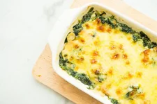 depositphotos_128531338-stock-photo-baked-spinach-lasagna.webp